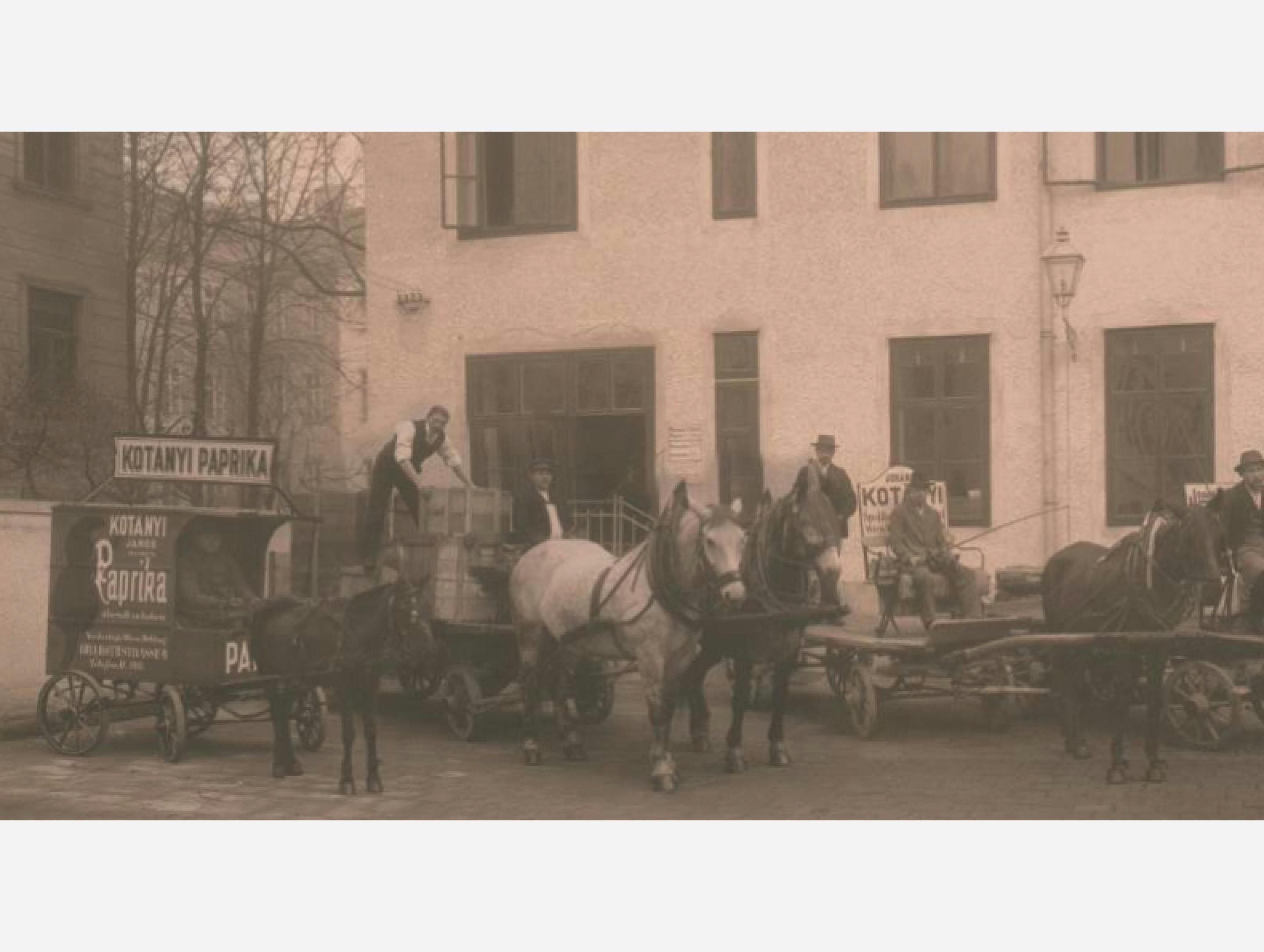 Black-and-white photograph: Paprika deliveries by horse-drawn carriage in 1881