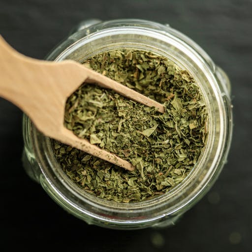 Dried herbs in a glass